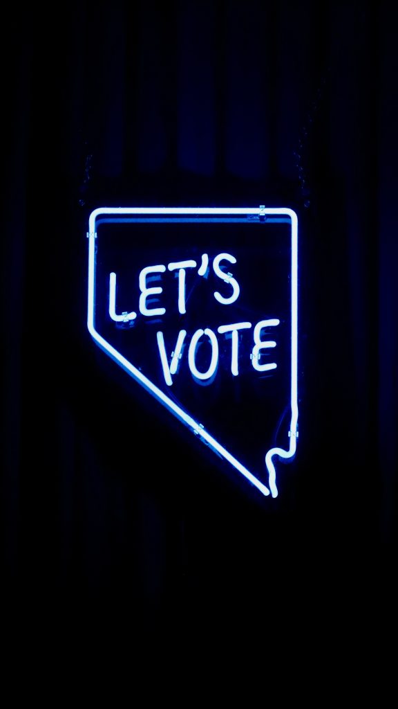 Let's Vote is in a speech bubble in LED lighting