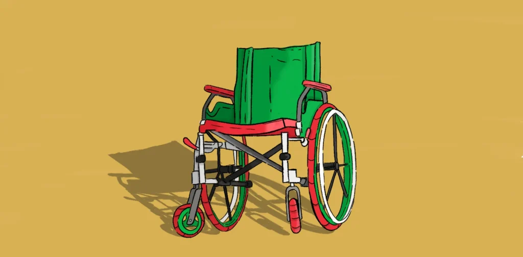 Empty green, red and black wheelchair