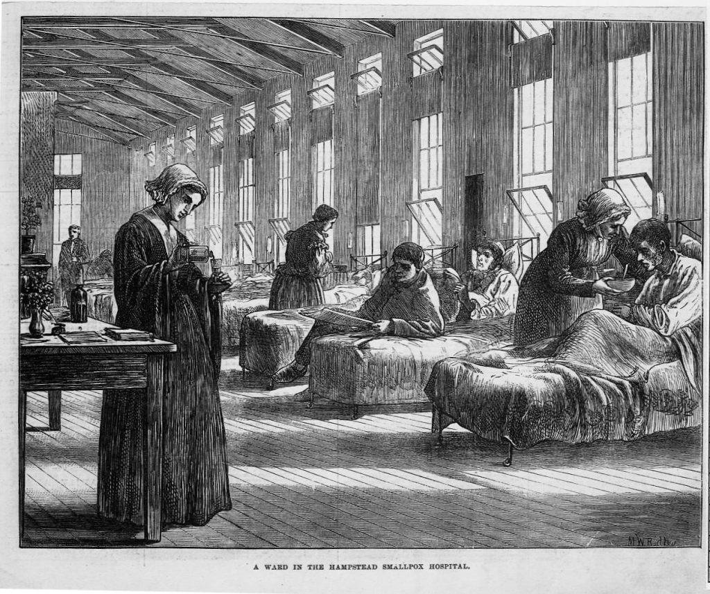 A black and white picture of a small pox ward during the Victorian age.